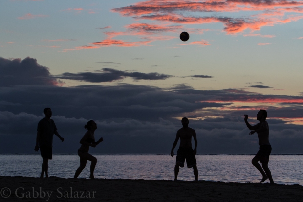 Rick and his classmates play ball on La Preneuse Beach at sunset in Mauritius. 